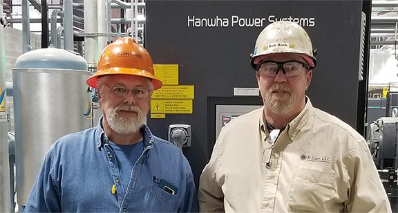 Bob Burk and Gene Thompson, founders of E Care LLC, on a Hanwha Power Systems job site